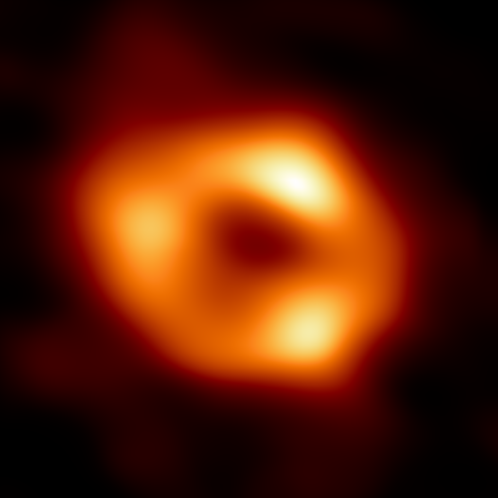 The glowing donut-shaped cloud around a black hole